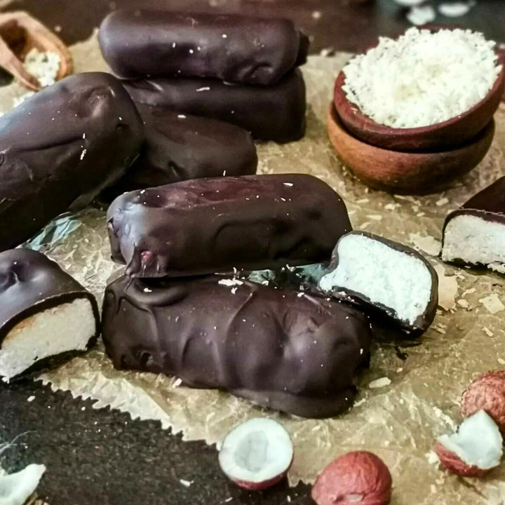 Kokos-Schoko-Riegel Rezept aus dem Thermomix®* Backbuch "Süß bin ich" – entdecke das Buch im Fitgemixt-Shop