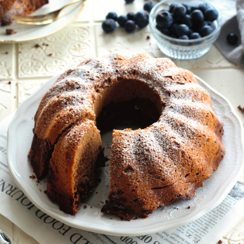 Saftiger Marmorkuchen Thermomix®-Rezept ohne Zucker – direkt nachbacken mit dem Fitgemixt-Backbuch, jetzt im Shop sichern.